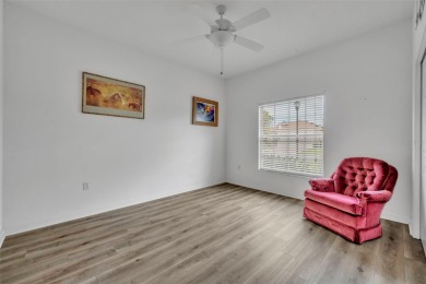 Presenting a well-maintained 2-bedroom, 2-bathroom home with an on Lake Ashton Golf Club in Florida - for sale on GolfHomes.com, golf home, golf lot