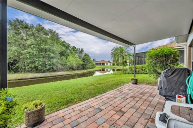 Presenting a well-maintained 2-bedroom, 2-bathroom home with an on Lake Ashton Golf Club in Florida - for sale on GolfHomes.com, golf home, golf lot