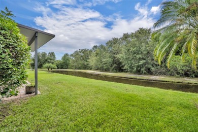 Presenting a well-maintained 2-bedroom, 2-bathroom home with an on Lake Ashton Golf Club in Florida - for sale on GolfHomes.com, golf home, golf lot