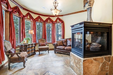 Perfectly positioned on the 10th green of the Angel Fire Resort on Angel Fire Resort Country Club in New Mexico - for sale on GolfHomes.com, golf home, golf lot