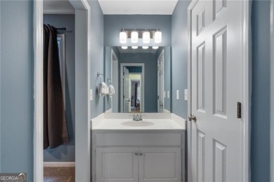 Welcome to this beautifully updated brick-front home offering a on Hamilton Mill Golf Club in Georgia - for sale on GolfHomes.com, golf home, golf lot