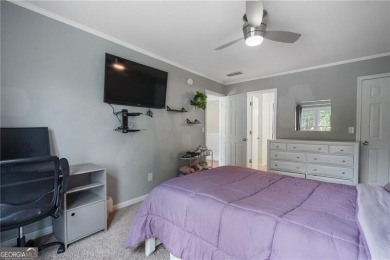 Welcome to this beautifully updated brick-front home offering a on Hamilton Mill Golf Club in Georgia - for sale on GolfHomes.com, golf home, golf lot