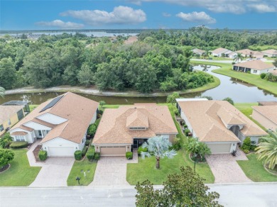 Presenting a well-maintained 2-bedroom, 2-bathroom home with an on Lake Ashton Golf Club in Florida - for sale on GolfHomes.com, golf home, golf lot