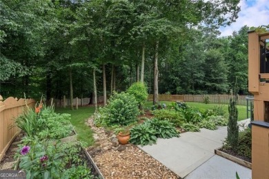 Welcome to this beautifully updated brick-front home offering a on Hamilton Mill Golf Club in Georgia - for sale on GolfHomes.com, golf home, golf lot