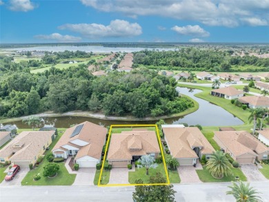 Presenting a well-maintained 2-bedroom, 2-bathroom home with an on Lake Ashton Golf Club in Florida - for sale on GolfHomes.com, golf home, golf lot