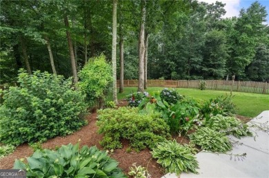 Welcome to this beautifully updated brick-front home offering a on Hamilton Mill Golf Club in Georgia - for sale on GolfHomes.com, golf home, golf lot