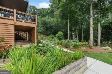 Welcome to this beautifully updated brick-front home offering a on Hamilton Mill Golf Club in Georgia - for sale on GolfHomes.com, golf home, golf lot