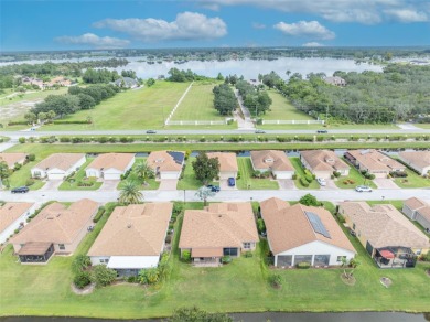 Presenting a well-maintained 2-bedroom, 2-bathroom home with an on Lake Ashton Golf Club in Florida - for sale on GolfHomes.com, golf home, golf lot