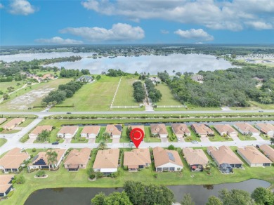 Presenting a well-maintained 2-bedroom, 2-bathroom home with an on Lake Ashton Golf Club in Florida - for sale on GolfHomes.com, golf home, golf lot