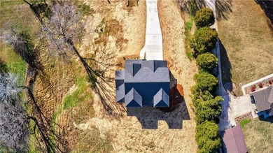 What an opportunity. Beautiful new construction set in the on Deep Springs Country Club, Inc. in North Carolina - for sale on GolfHomes.com, golf home, golf lot