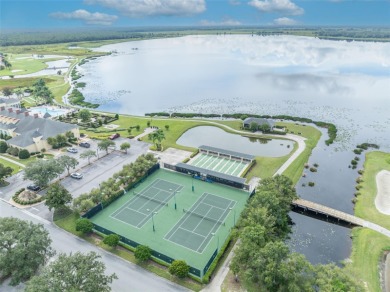Presenting a well-maintained 2-bedroom, 2-bathroom home with an on Lake Ashton Golf Club in Florida - for sale on GolfHomes.com, golf home, golf lot