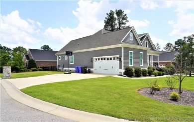 This picturesque home in the gated section of Kings Grant golf on Kings Grant Golf and Country Club in North Carolina - for sale on GolfHomes.com, golf home, golf lot