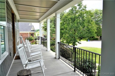 This picturesque home in the gated section of Kings Grant golf on Kings Grant Golf and Country Club in North Carolina - for sale on GolfHomes.com, golf home, golf lot