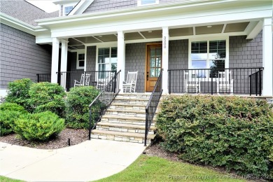 This picturesque home in the gated section of Kings Grant golf on Kings Grant Golf and Country Club in North Carolina - for sale on GolfHomes.com, golf home, golf lot