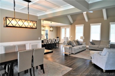 This picturesque home in the gated section of Kings Grant golf on Kings Grant Golf and Country Club in North Carolina - for sale on GolfHomes.com, golf home, golf lot