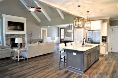 This picturesque home in the gated section of Kings Grant golf on Kings Grant Golf and Country Club in North Carolina - for sale on GolfHomes.com, golf home, golf lot
