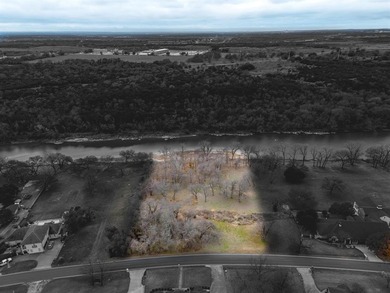 Nestled on nearly two acres with rare Brazos River frontage on Pecan Plantation Country Club in Texas - for sale on GolfHomes.com, golf home, golf lot