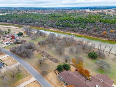 Nestled on nearly two acres with rare Brazos River frontage on Pecan Plantation Country Club in Texas - for sale on GolfHomes.com, golf home, golf lot