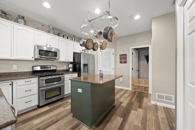 This updated corner townhome is ideally located near golf on Otter Creek Golf Course in Iowa - for sale on GolfHomes.com, golf home, golf lot