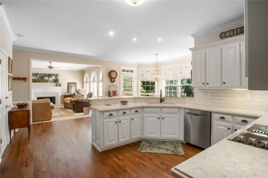 Tucked into a quiet cul-de-sac in sought-after Windward, this on The Golf Club of Georgia in Georgia - for sale on GolfHomes.com, golf home, golf lot