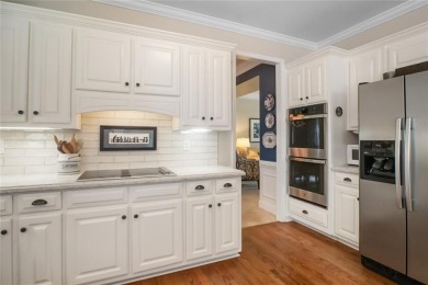 Tucked into a quiet cul-de-sac in sought-after Windward, this on The Golf Club of Georgia in Georgia - for sale on GolfHomes.com, golf home, golf lot
