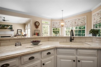 Tucked into a quiet cul-de-sac in sought-after Windward, this on The Golf Club of Georgia in Georgia - for sale on GolfHomes.com, golf home, golf lot