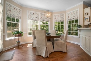Tucked into a quiet cul-de-sac in sought-after Windward, this on The Golf Club of Georgia in Georgia - for sale on GolfHomes.com, golf home, golf lot