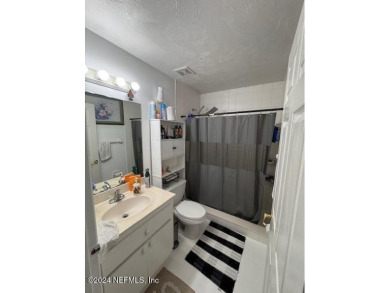 Look no further!  This 4 bedroom, 2 bath split floorpan home is on Daytona Beach Golf Club in Florida - for sale on GolfHomes.com, golf home, golf lot