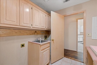 Nestled on a hilltop with a view of Lake Ray Hubbard, in the on Lakeside Village Golf Course in Texas - for sale on GolfHomes.com, golf home, golf lot