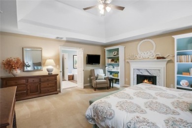 Tucked into a quiet cul-de-sac in sought-after Windward, this on The Golf Club of Georgia in Georgia - for sale on GolfHomes.com, golf home, golf lot