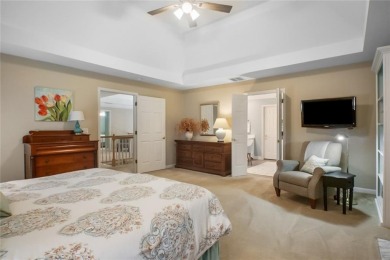 Tucked into a quiet cul-de-sac in sought-after Windward, this on The Golf Club of Georgia in Georgia - for sale on GolfHomes.com, golf home, golf lot