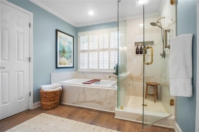 Tucked into a quiet cul-de-sac in sought-after Windward, this on The Golf Club of Georgia in Georgia - for sale on GolfHomes.com, golf home, golf lot