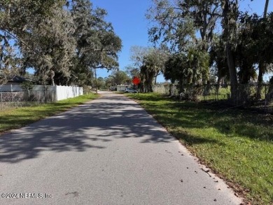 Look no further!  This 4 bedroom, 2 bath split floorpan home is on Daytona Beach Golf Club in Florida - for sale on GolfHomes.com, golf home, golf lot