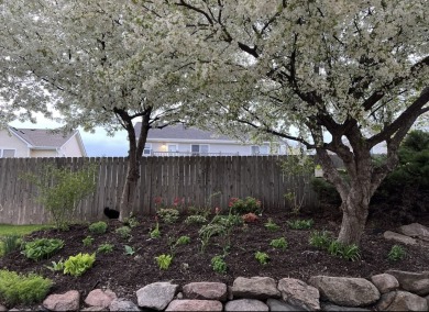This updated corner townhome is ideally located near golf on Otter Creek Golf Course in Iowa - for sale on GolfHomes.com, golf home, golf lot