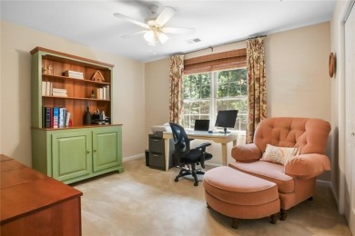 Tucked into a quiet cul-de-sac in sought-after Windward, this on The Golf Club of Georgia in Georgia - for sale on GolfHomes.com, golf home, golf lot