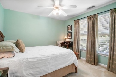 Tucked into a quiet cul-de-sac in sought-after Windward, this on The Golf Club of Georgia in Georgia - for sale on GolfHomes.com, golf home, golf lot