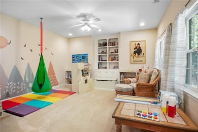 Tucked into a quiet cul-de-sac in sought-after Windward, this on The Golf Club of Georgia in Georgia - for sale on GolfHomes.com, golf home, golf lot