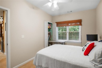 Tucked into a quiet cul-de-sac in sought-after Windward, this on The Golf Club of Georgia in Georgia - for sale on GolfHomes.com, golf home, golf lot