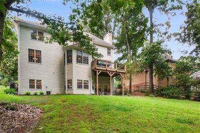 Tucked into a quiet cul-de-sac in sought-after Windward, this on The Golf Club of Georgia in Georgia - for sale on GolfHomes.com, golf home, golf lot