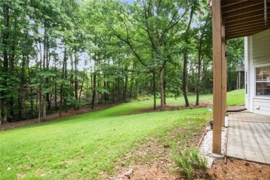 Tucked into a quiet cul-de-sac in sought-after Windward, this on The Golf Club of Georgia in Georgia - for sale on GolfHomes.com, golf home, golf lot
