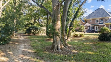 This luxurious brick home is nestled in the prestigious Church on Bayville Golf Club in Virginia - for sale on GolfHomes.com, golf home, golf lot