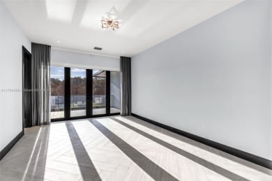 Experience luxurious living in this stunning 7-bedroom estate on Riviera Country Club in Florida - for sale on GolfHomes.com, golf home, golf lot