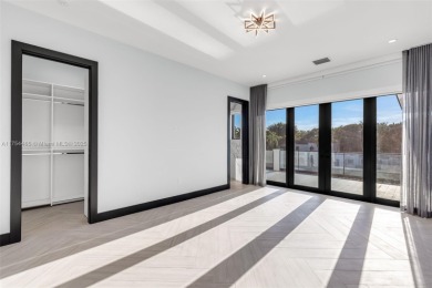 Experience luxurious living in this stunning 7-bedroom estate on Riviera Country Club in Florida - for sale on GolfHomes.com, golf home, golf lot