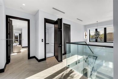 Experience luxurious living in this stunning 7-bedroom estate on Riviera Country Club in Florida - for sale on GolfHomes.com, golf home, golf lot