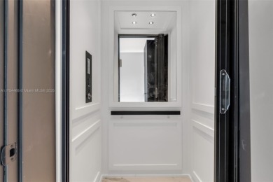 Experience luxurious living in this stunning 7-bedroom estate on Riviera Country Club in Florida - for sale on GolfHomes.com, golf home, golf lot