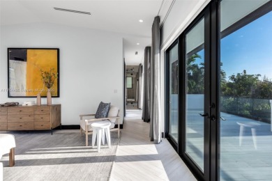 Experience luxurious living in this stunning 7-bedroom estate on Riviera Country Club in Florida - for sale on GolfHomes.com, golf home, golf lot