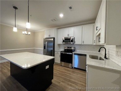 This beautiful three bedroom, two bathroom luxury condo in on Anderson Creek Golf Club in North Carolina - for sale on GolfHomes.com, golf home, golf lot