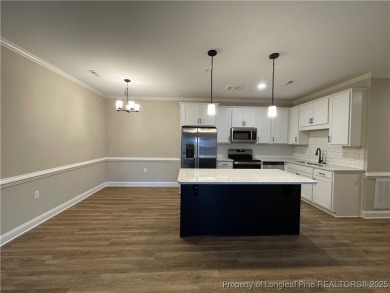 This beautiful three bedroom, two bathroom luxury condo in on Anderson Creek Golf Club in North Carolina - for sale on GolfHomes.com, golf home, golf lot