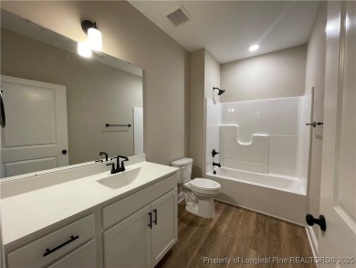 This beautiful three bedroom, two bathroom luxury condo in on Anderson Creek Golf Club in North Carolina - for sale on GolfHomes.com, golf home, golf lot
