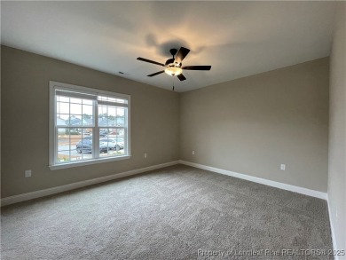 This beautiful three bedroom, two bathroom luxury condo in on Anderson Creek Golf Club in North Carolina - for sale on GolfHomes.com, golf home, golf lot